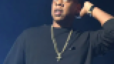 JAY-Z says he and Beyoncé sat during Super Bowl National Anthem because they were working