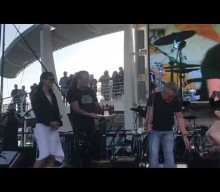 Watch The Who’s Roger Daltrey pelt a birthday cake into Sebastian Bach’s face