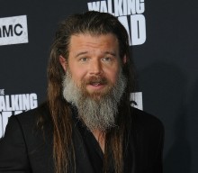 Here’s ‘The Walking Dead’s Beta singing as his musician alter-ego, Half Moon