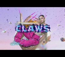 Watch Charli XCX have fun with a green screen in new ‘Claws’ video