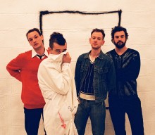 Watch The 1975’s new video for ‘Yeah I Know’ featuring a robot drawing consciousness