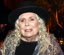 Joni Mitchell says she’s “still struggling to walk” following 2015 aneurysm