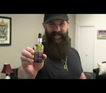 DREAM THEATER’s JOHN PETRUCCI Unboxes His Signature Range Of Specialty Beard And Mustache Products (Video)