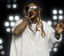 Lil Wayne has been charged with gun possession
