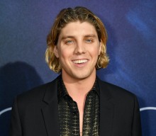 Director “shit talking” Lukas Gage revealed as Tristram Shapeero