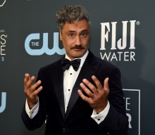 Watch Taika Waititi accept Grammy award for ‘JoJo Rabbit’ on ‘Thor: Love and Thunder’ set