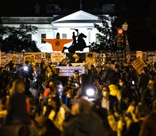 Protestors gather outside the White House as election polls close