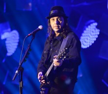 System Of A Down’s Daron Malakian tells fans “guns are essential” after sharing fan’s gun and drum cover of ‘B.Y.O.B.’