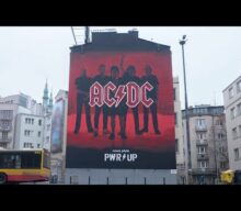 Watch Massive AC/DC ‘Power Up’ Mural Being Painted In Warsaw, Poland