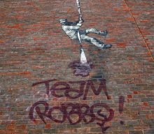 Name of Banksy’s late rival sprayed on Reading Prison mural