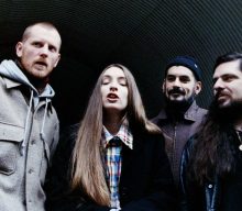 Dry Cleaning perform in a carpet shop in new ‘Unsmart Lady’ music video