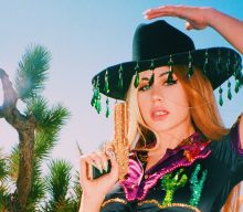 Listen to Slayyyter’s fuzzy new single ‘Cowboys’