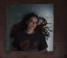 Watch Holly Humberstone’s claustrophobic video for new single ‘The Walls Are Way Too Thin’