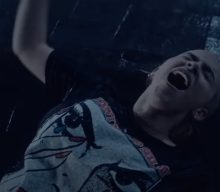 Billie Eilish fights a literal flood of emotion in striking new video for ‘Happier Than Ever’