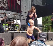 Watch a toddler storm the stage at an extreme metal festival