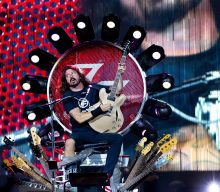 Dave Grohl lends stage throne to Greyhawk bassist shot in leg
