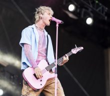 Crowd throws bottles and branches at Machine Gun Kelly during Aftershock set