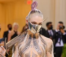 Grimes gives fans permission to use her voice on songs created by AI
