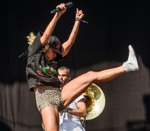 Brass Against reinvent Rage Against The Machine’s ‘Wake Up’ for ‘The Matrix Resurrections’