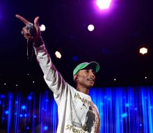 Watch Pharrell throw first pitch at NY Yankees game