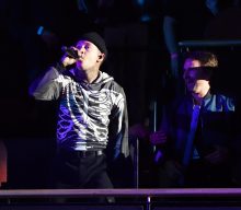 Watch Muse’s Matt Bellamy embarrass his kids at Twenty One Pilots show