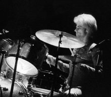 David Bowie tribute band remove unvaccinated drummer Woody Woodmansey