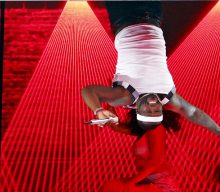 50 Cent admits hanging upside down at Super Bowl was “a mistake”