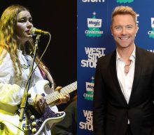 Listen to Wet Leg’s cover of Ronan Keating‘s ‘Life Is A Rollercoaster’