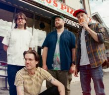 PUP go corporate in the video for their new single ‘Totally Fine’