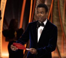 New video emerges of Chris Rock looking stunned in moments after Will Smith slapped him
