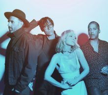 Metric announce new album ‘Formentera’, share ‘All Comes Crashing’