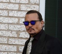 Johnny Depp focusing on a “doodle” in court goes viral