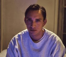 Oliver Sim shares new single ‘Hideous’ about his HIV diagnosis