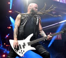 Five Finger Death Punch’s Chris Kael tells artists who threaten to leave America to “stop bullshittin’”
