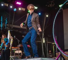 Check out Jarvis Cocker dressed in the style of various British Rail train tickets