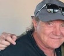 AC/DC’s BRIAN JOHNSON Photographed Backstage At THE ROLLING STONES Concert In London