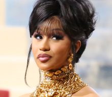 Watch Cardi B get her first face tattoo