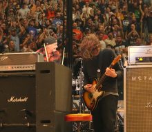 Watch Pearl Jam play ‘Rockin’ In The Free World’ with RHCP’s Chad Smith