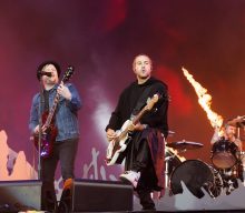 Fall Out Boy began work on “guitar-based” new material that is now on the “back burner”