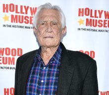 Former James Bond star George Lazenby apologises for “homophobic” and “misogynistic” comments