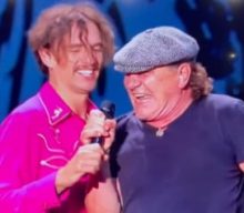 JUSTIN HAWKINS Defends Taking Microphone Away From BRIAN JOHNSON During ‘Back In Black’