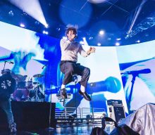 Turnstile live at Brooklyn Mirage — 12 powerful photos from their rain-drenched set