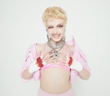 See Chloe Moriondo’s behind-the-scenes photos from wacky ‘Plastic Purse’ video