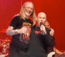 Watch: JOHN BUSH Rejoins ARMORED SAINT On Stage After Sitting Out Shows Due To Respiratory Infection