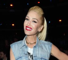 Gwen Stefani has decorated her bathroom with tabloid newspapers