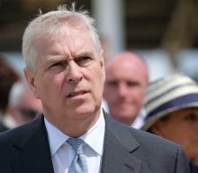 Billboard for ‘Prince Andrew: The Musical’ installed outside Woking Pizza Express